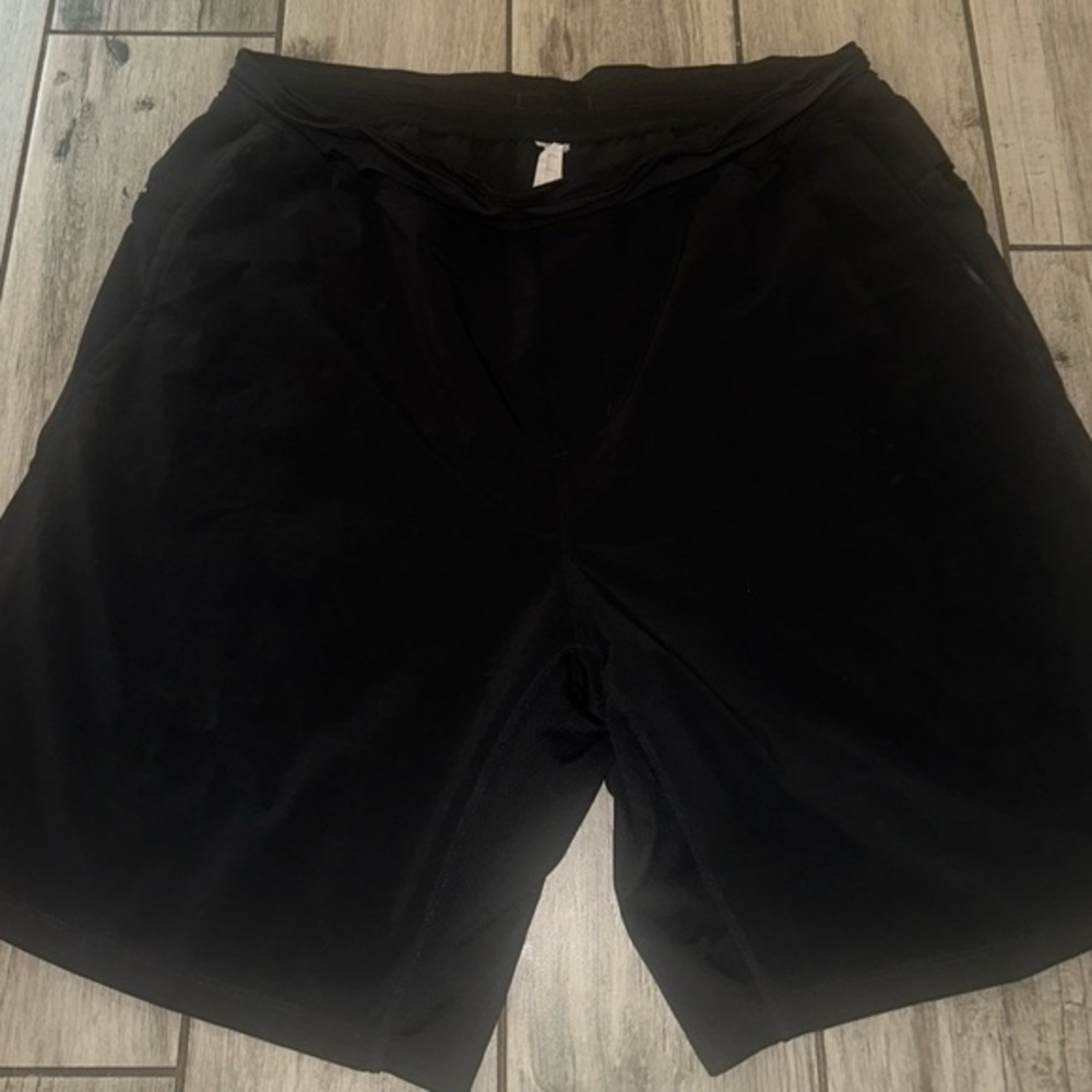 Mens used Fabletics  shorts size L larg Pre own items are as is any defects